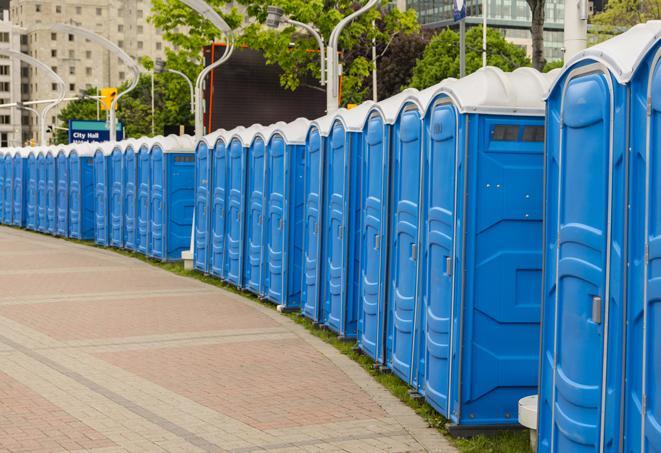 a row of portable restrooms at a fairground, offering visitors a clean and hassle-free experience in Fort Walton Beach